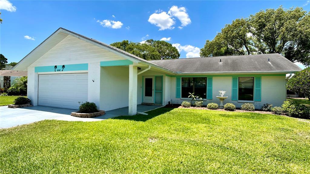 Property Photo:  8640 Wind Mill Drive  FL 34655 