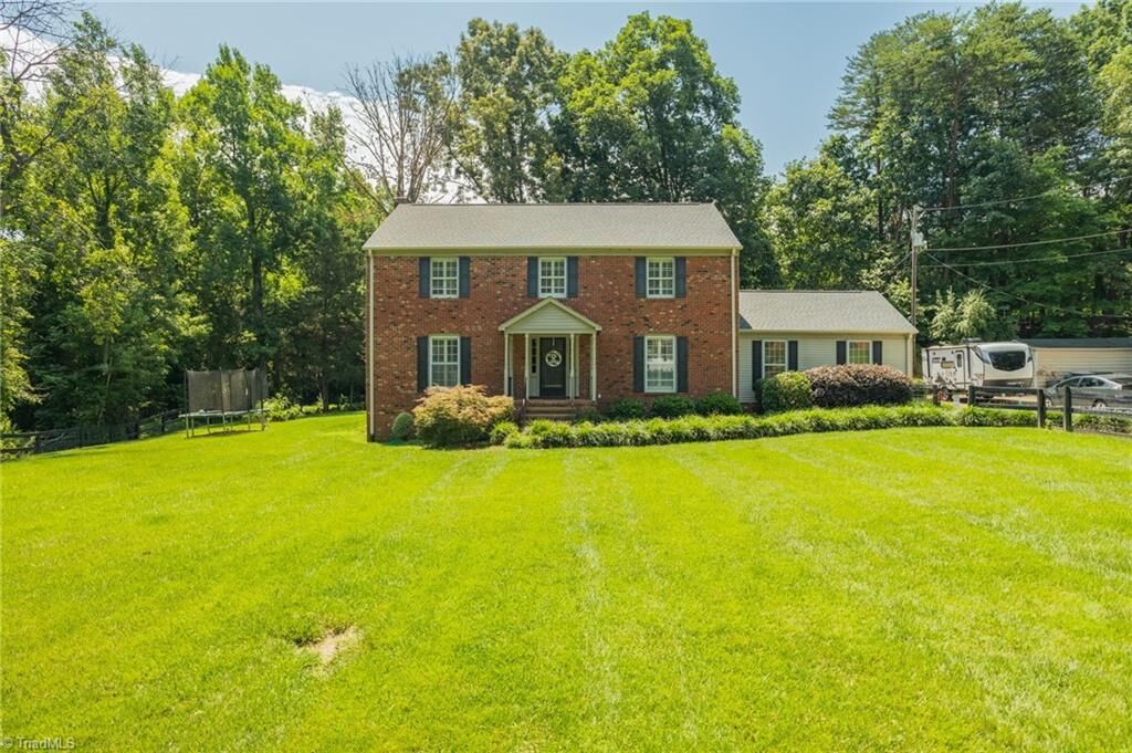 Property Photo:  5801 Carriage Lane  NC 27410 