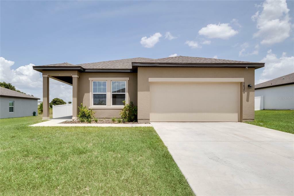 Property Photo: 16375 Winding Blossom Drive FL 34736