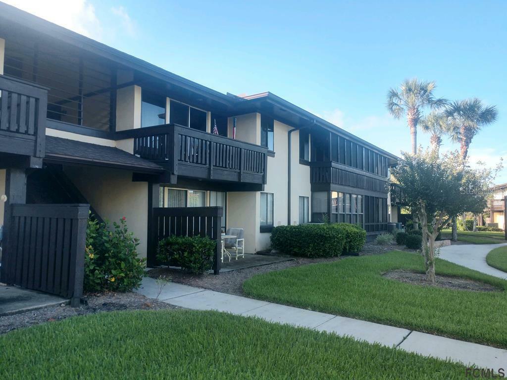 Property Photo:  48 Club House Drive 202  FL 32137 