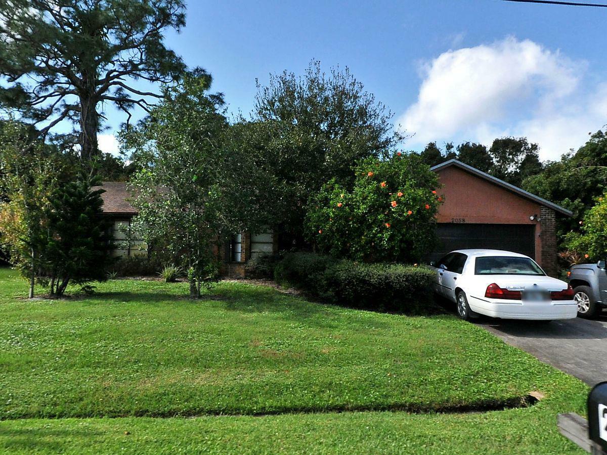 Property Photo:  2058 SE Parrot Street  FL 34952 