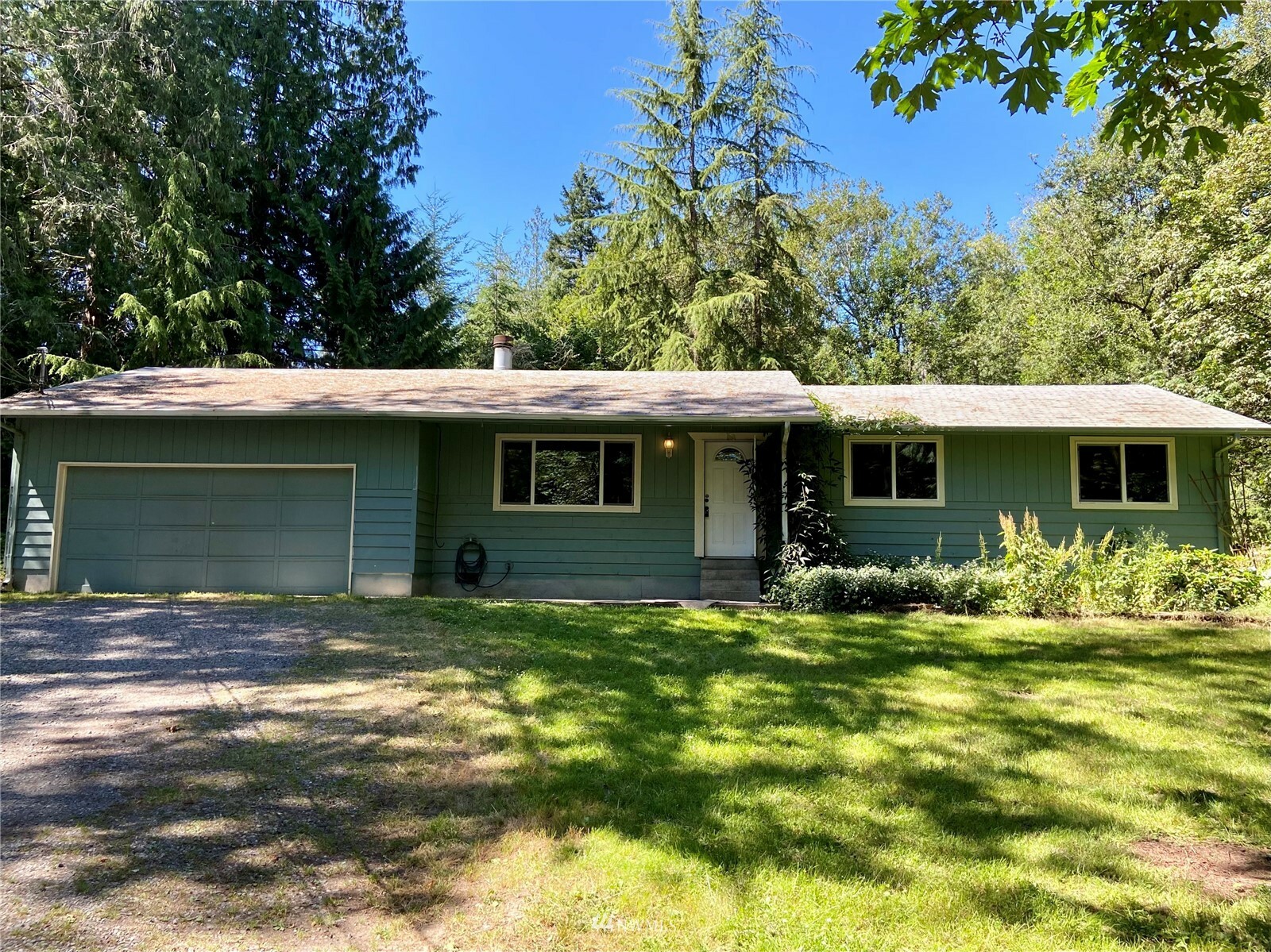 Property Photo:  2412 McEwan Road NW  WA 98349 