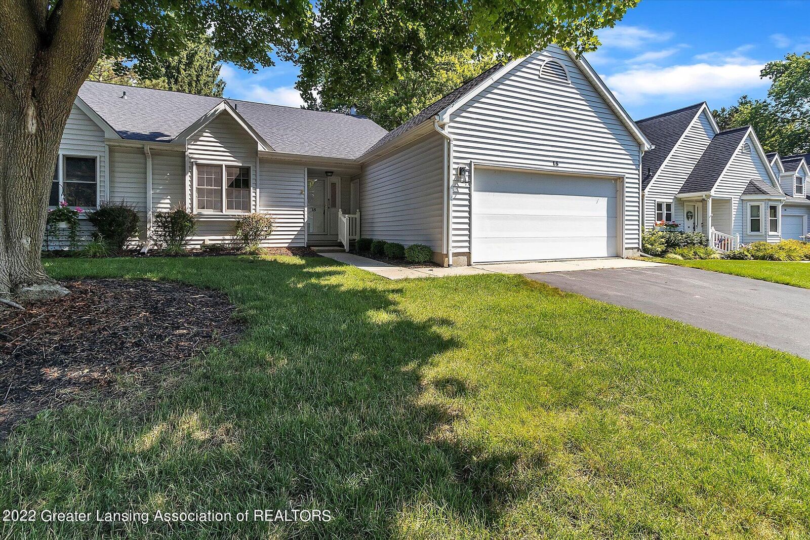 Property Photo:  15 Cedarwoods  MI 48854 