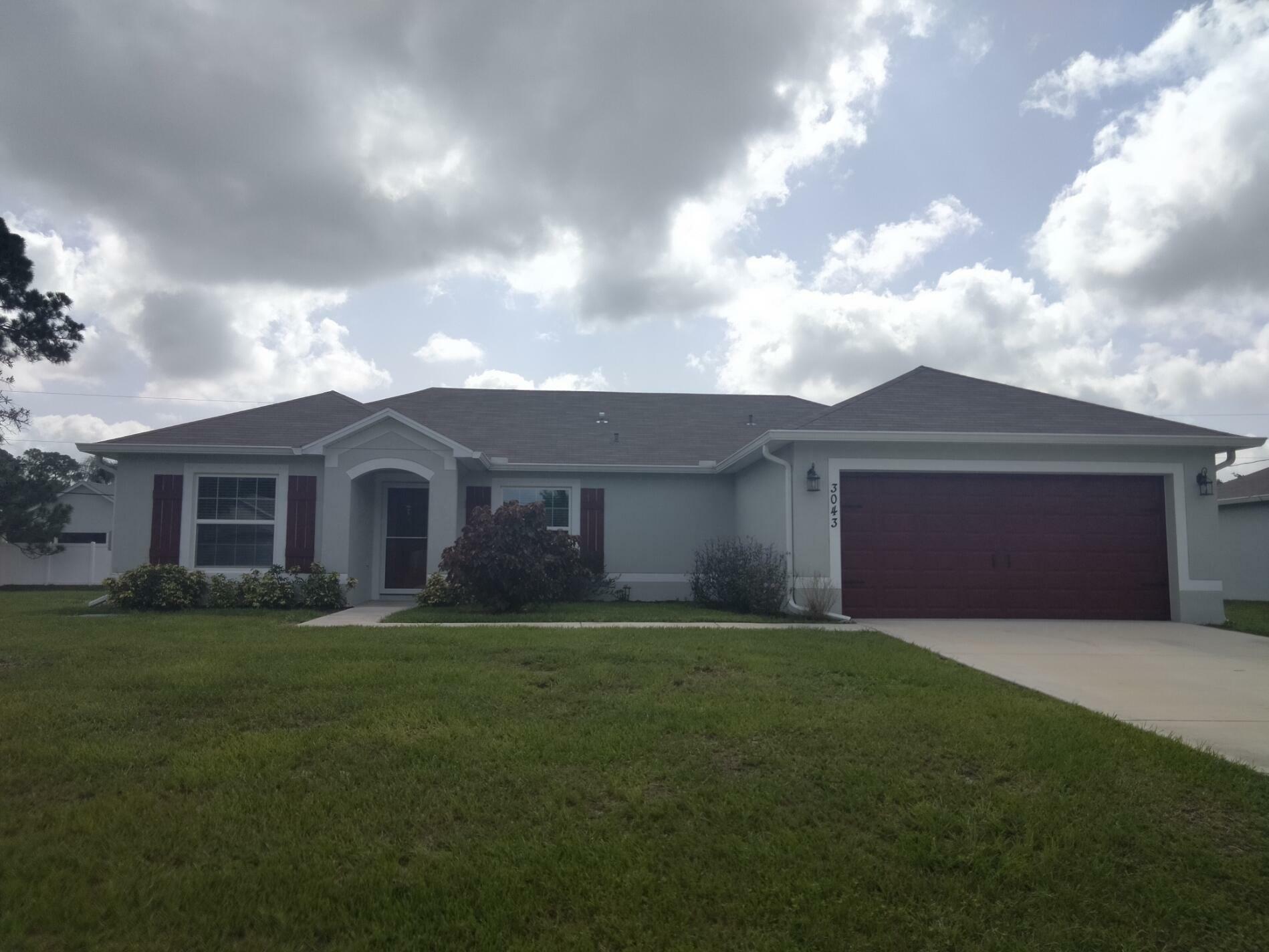 Property Photo:  3043 SW Lucerne Street  FL 34953 