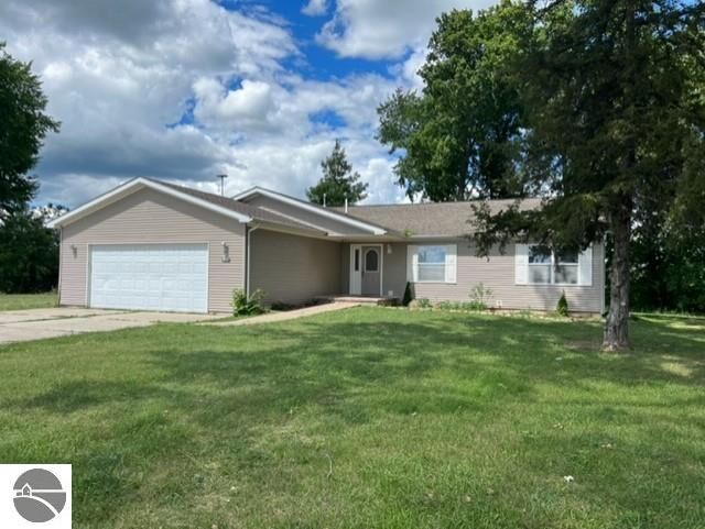 Property Photo:  5582 S Wells Road  MI 48847 