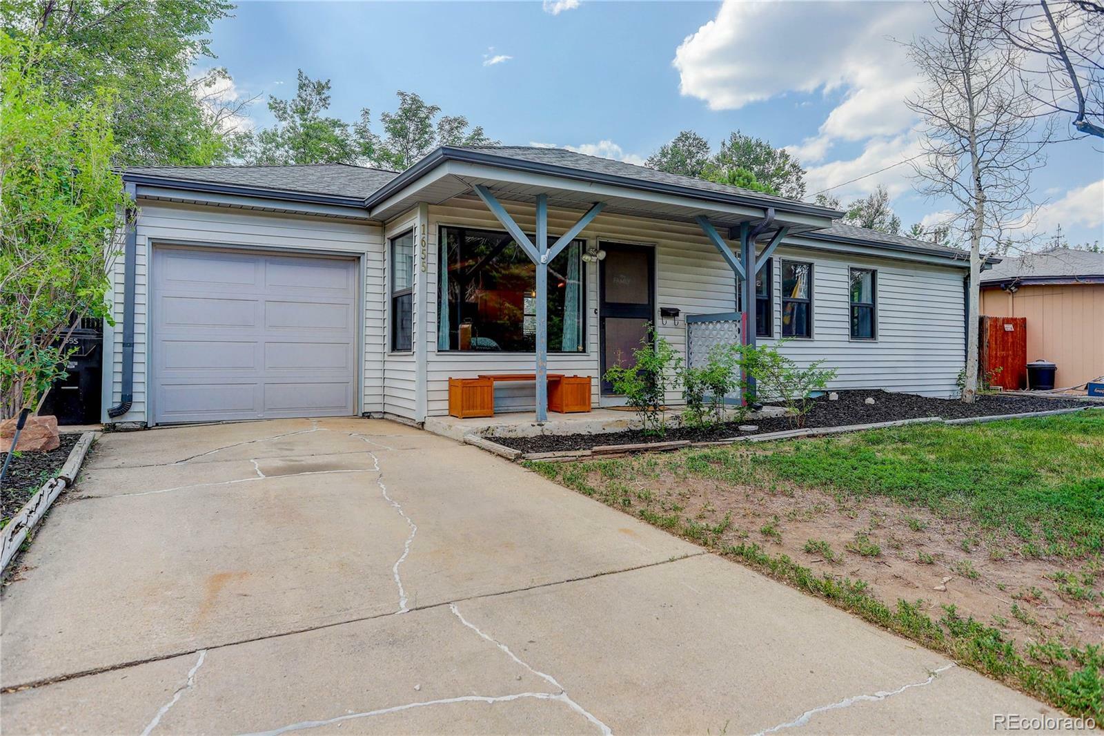 Property Photo: 1655 S Newton Street CO 80219