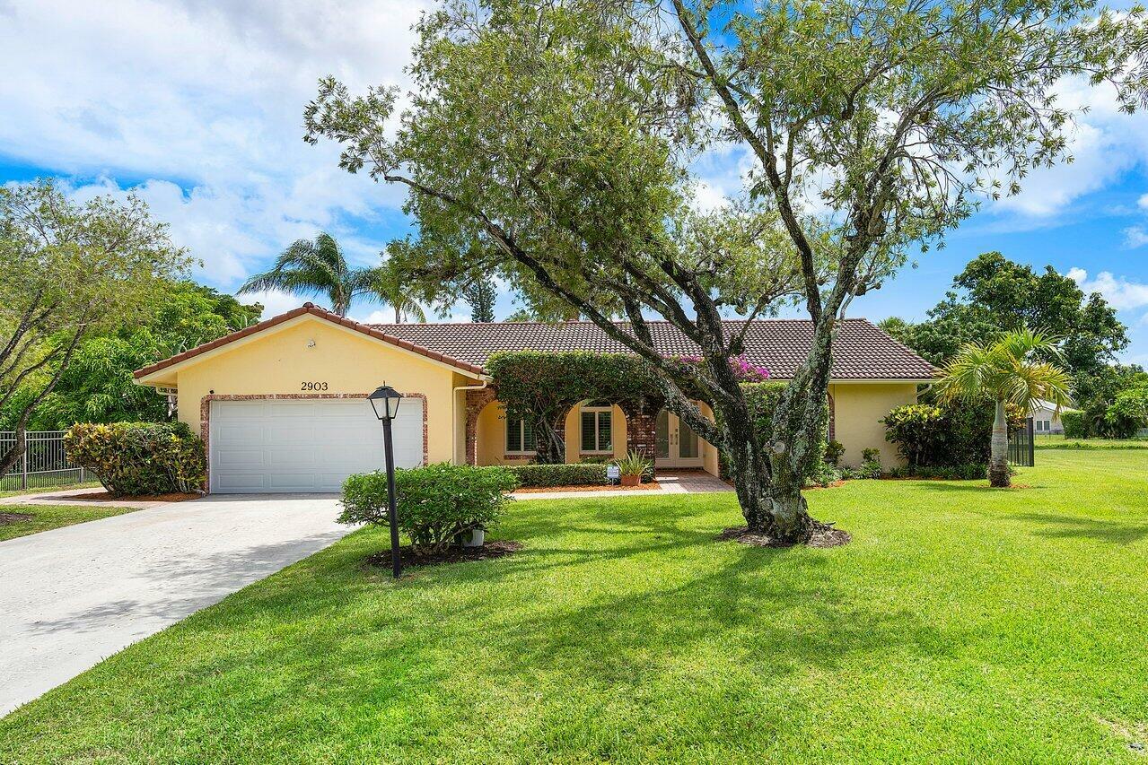 Property Photo:  2903 NW 23rd Court  FL 33431 