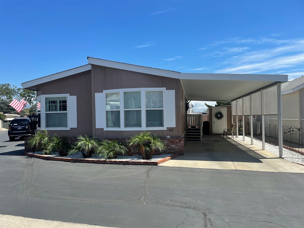 Property Photo:  8651 Foothill Boulevard 65  CA 91730 