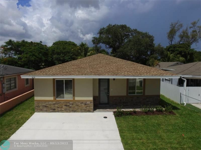 Property Photo:  913 NW 2nd Ave  FL 33009 