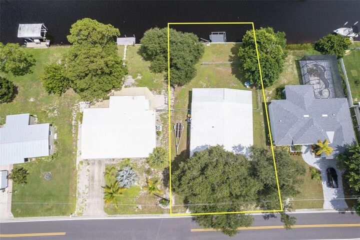 Property Photo:  815 Palmetto Drive NE  FL 33952