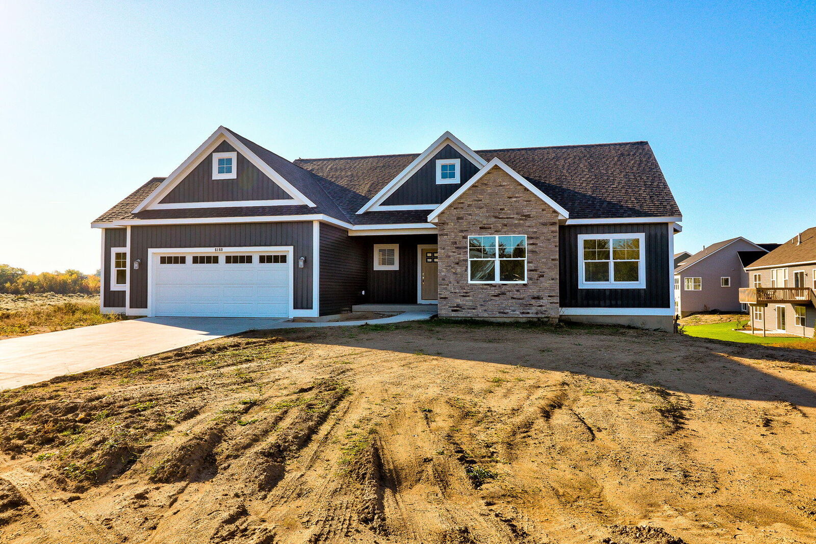 Property Photo:  6160 Lake Wind Avenue  MI 49423 