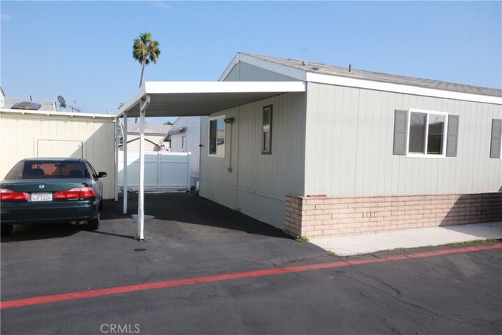 Property Photo:  7652 Garfield Avenue 86  CA 92648 