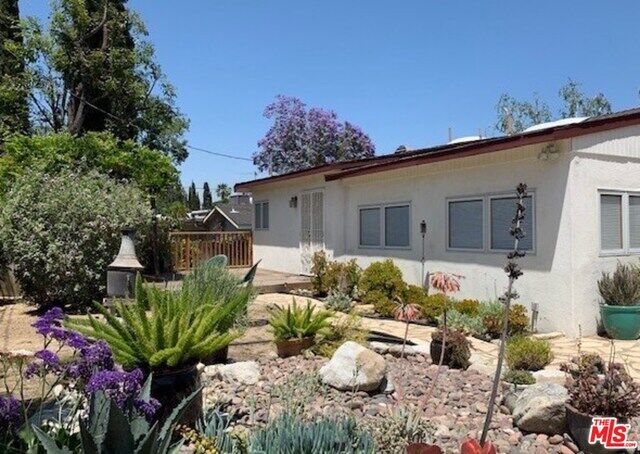 Property Photo:  5139  Etiwanda Ave  CA 91356 