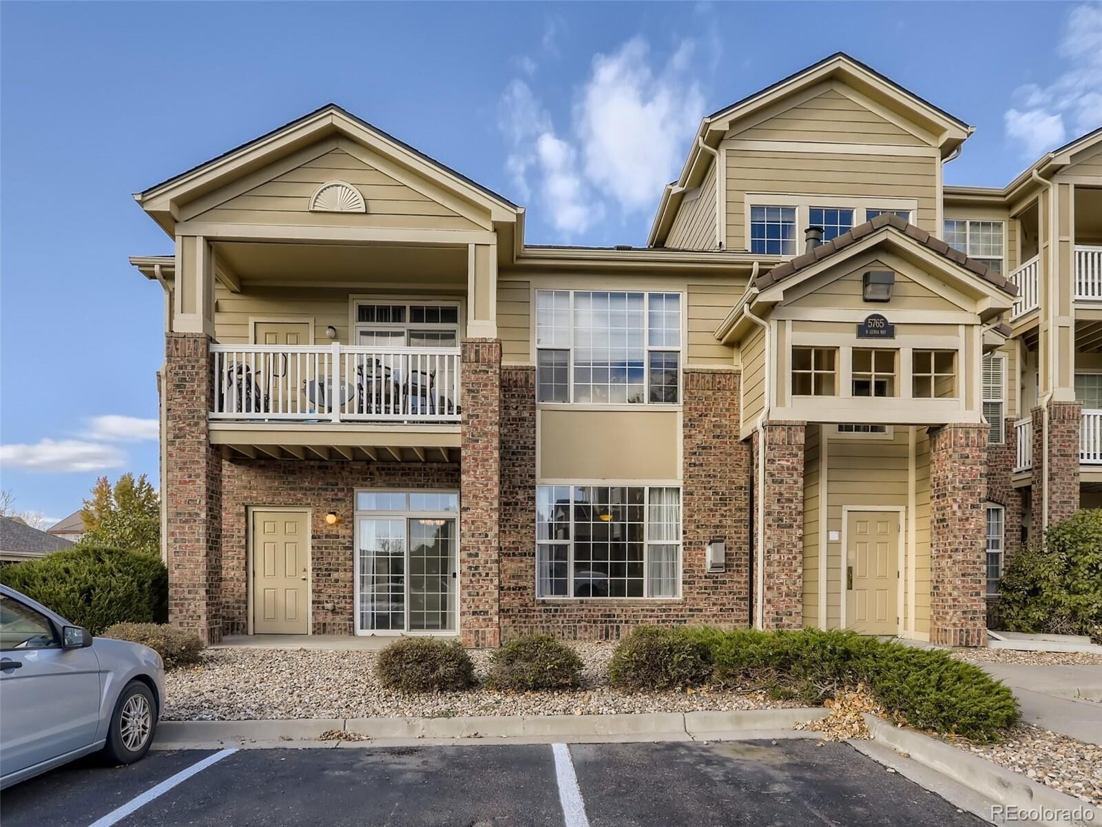 Property Photo:  5765 N Genoa Way 1-101  CO 80019 