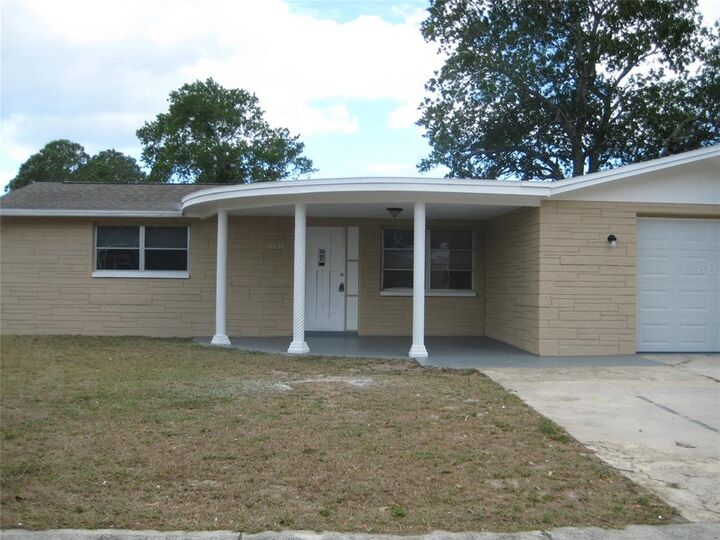 Property Photo:  4839 Alcea St  FL 34652 