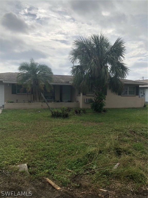 Property Photo:  206 SE 44th Street  FL 33904 