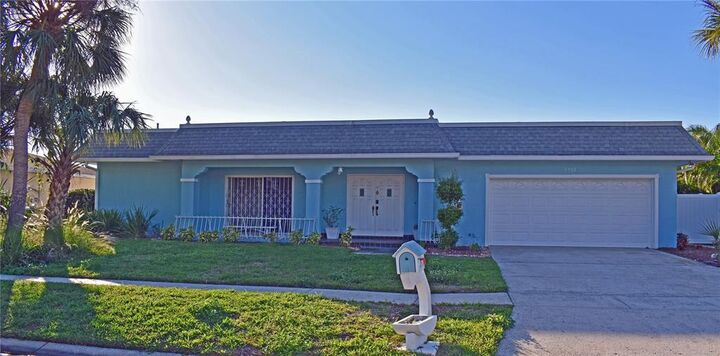 Property Photo:  3918 Doral Drive  FL 33634 