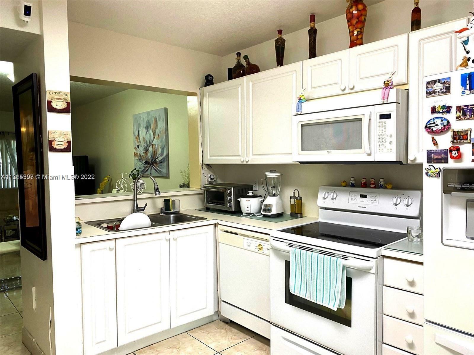 Property Photo:  7205 NW 173rd Dr 607-6  FL 33015 