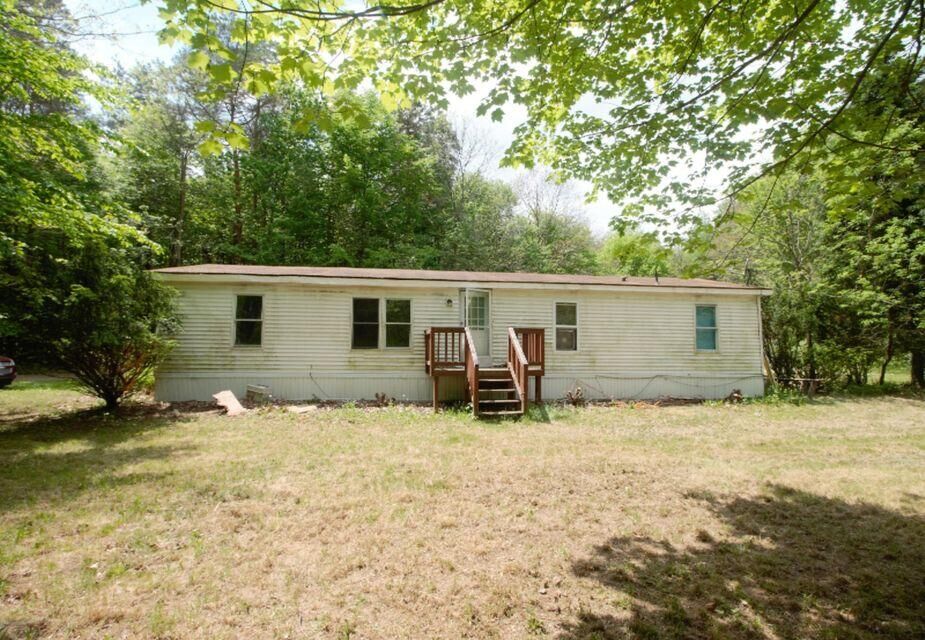 Property Photo:  16923 Trufant Avenue NE  MI 49343 