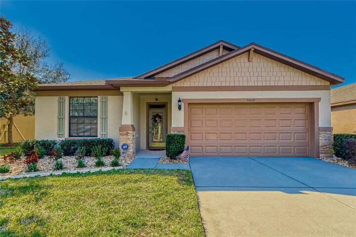 Property Photo:  6009 Magnolia Park Boulevard  FL 33578 