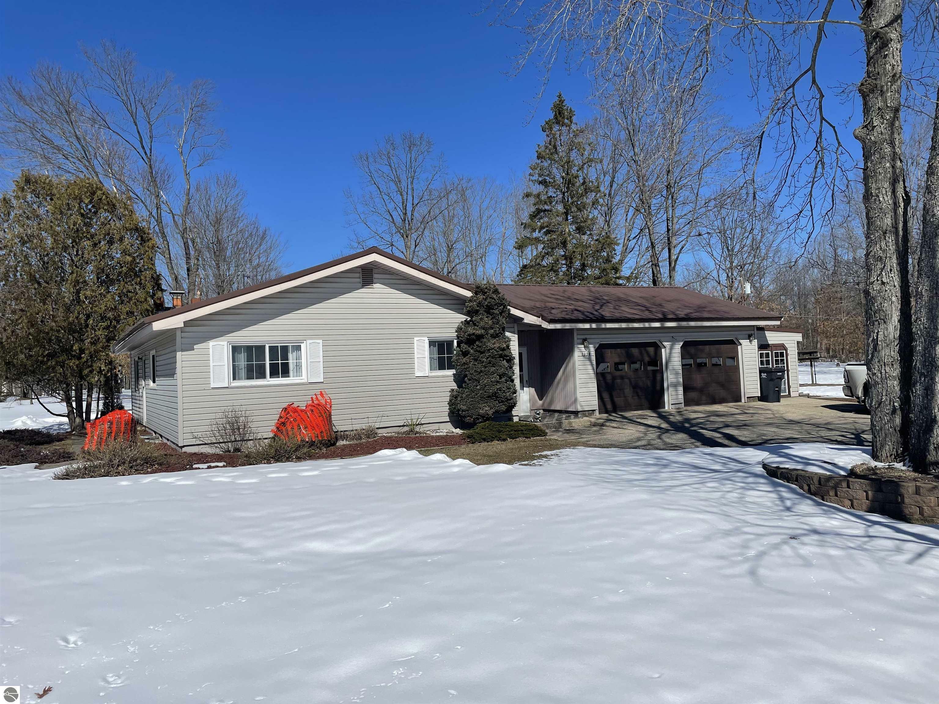 Property Photo:  1334 NW Island Lake Road  MI 49646 