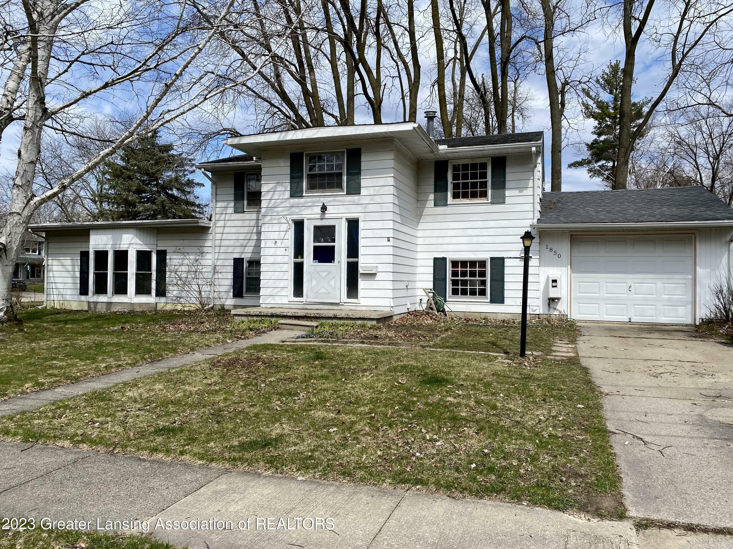 Property Photo:  1850 Sherbrook Way  MI 48840 