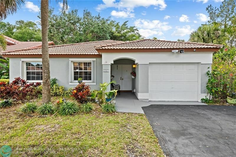 Property Photo:  5561 NW 49th Way  FL 33073 