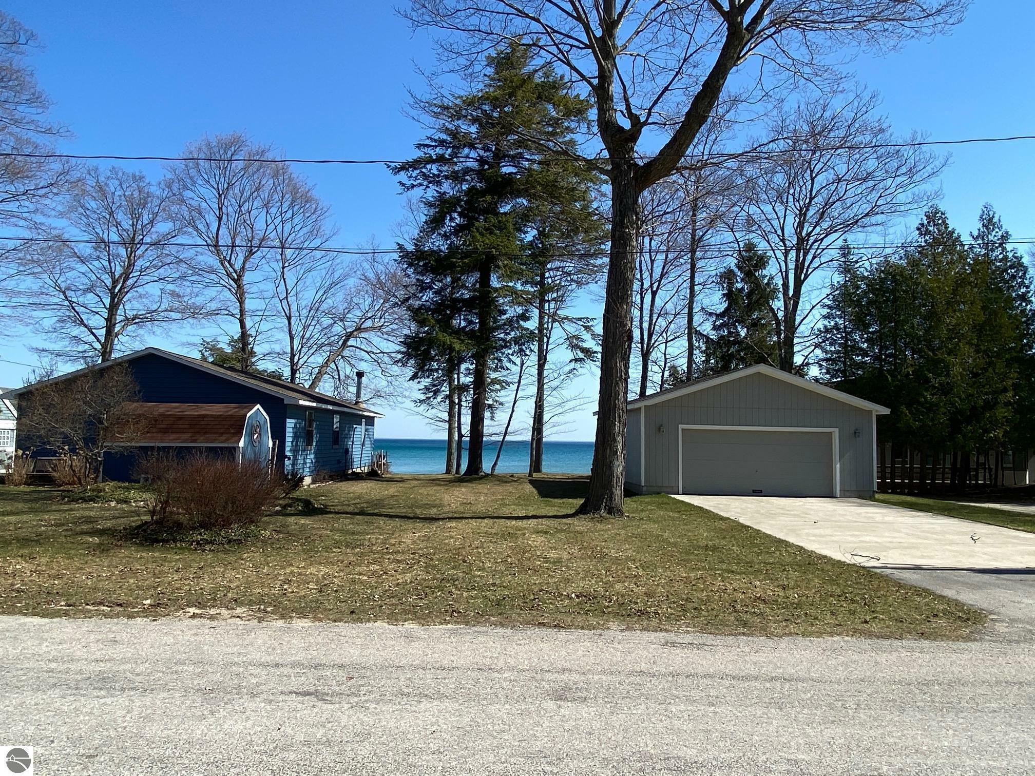 Property Photo:  14643 N Forest Beach Shores  MI 49670 