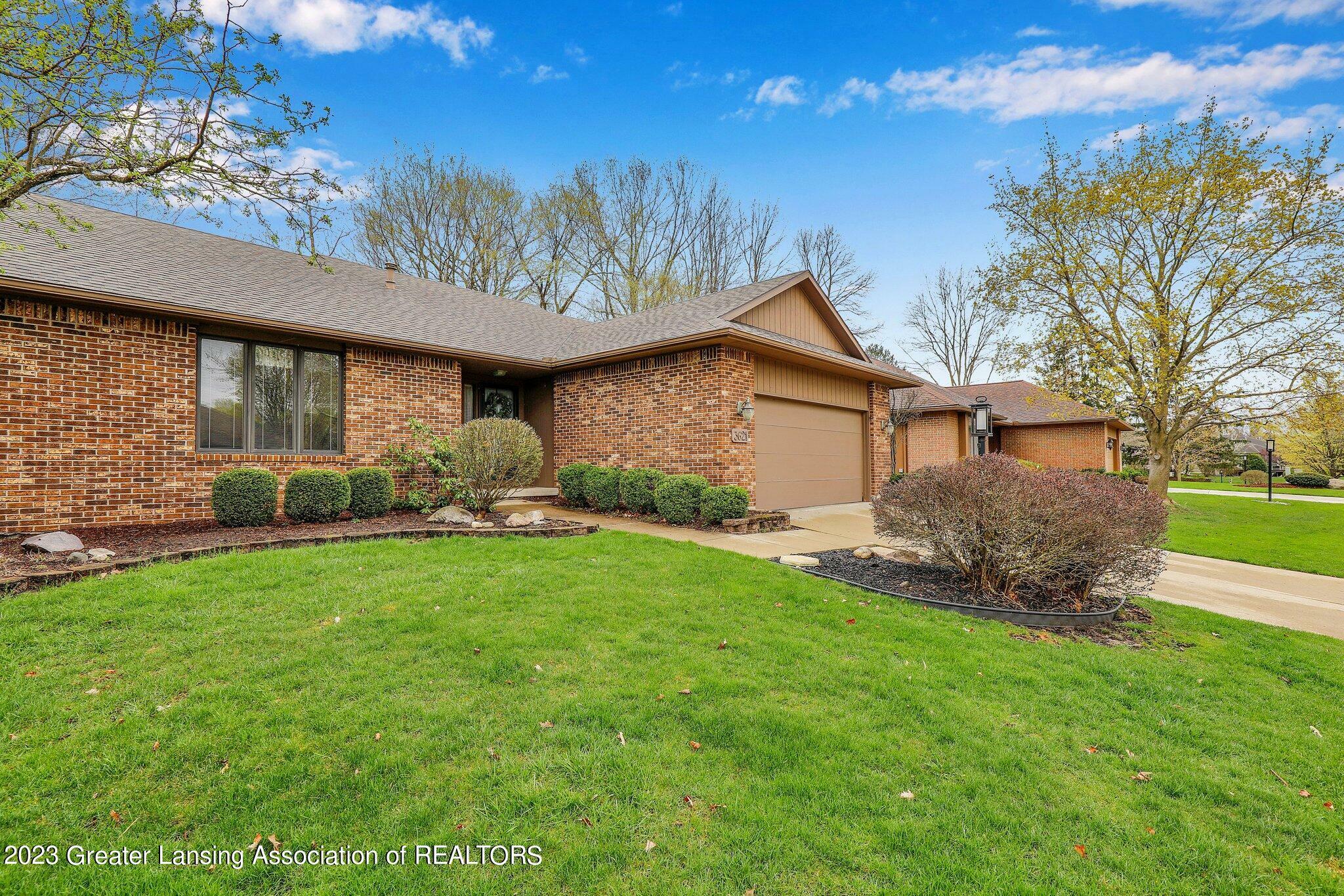 Property Photo:  3621 Muirfield Drive  MI 48911 