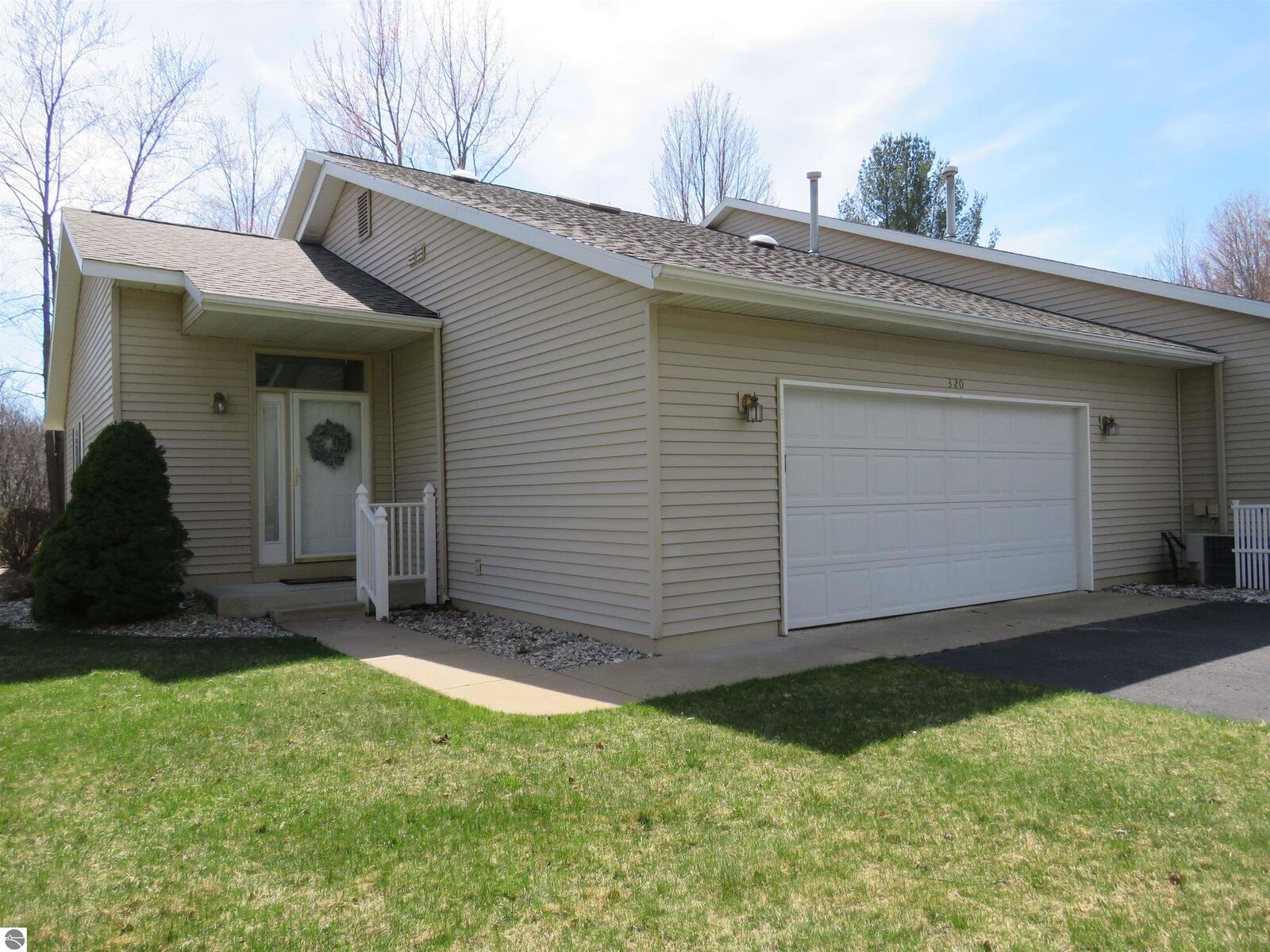 Property Photo:  320 Woodside Circle  MI 49601 