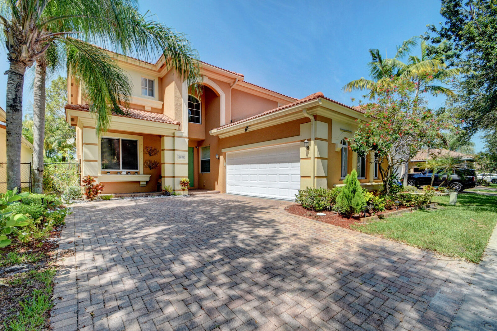 Property Photo:  6787 Aliso Avenue  FL 33413 