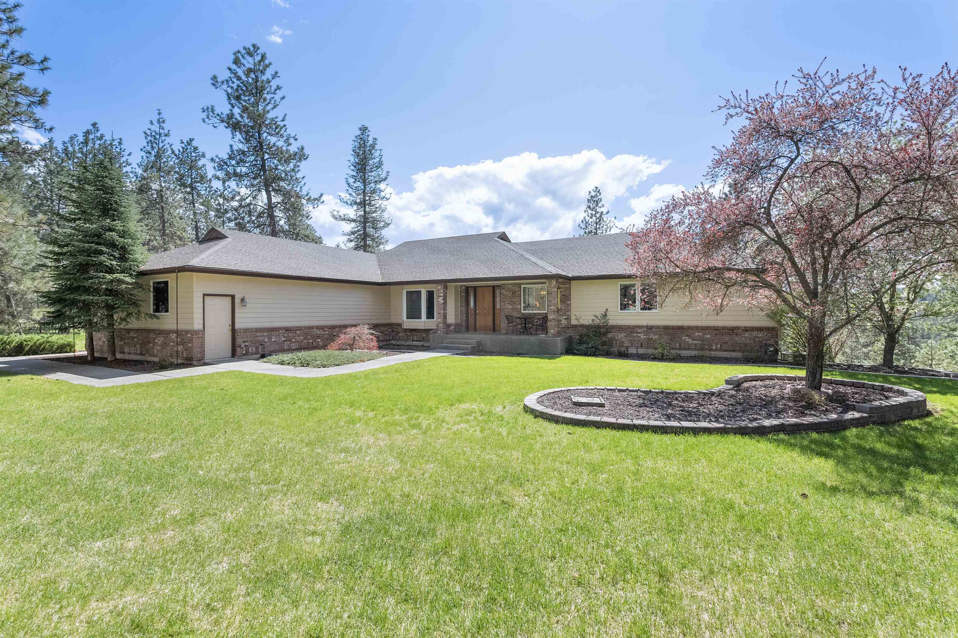 Property Photo: 23531 N Meadow River Ln WA 99003