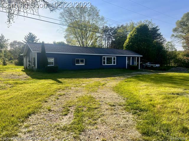Property Photo: 571 Heenan Drive MI 48446