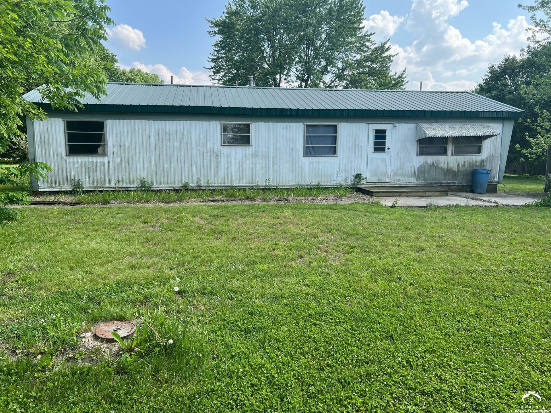 Property Photo:  407 Poplar Street  KS 66097 