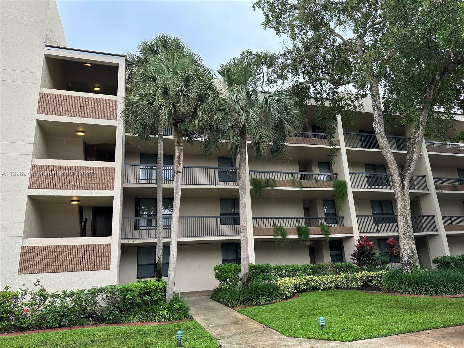 Property Photo:  100 NW 76th Ave 202-2  FL 33324 