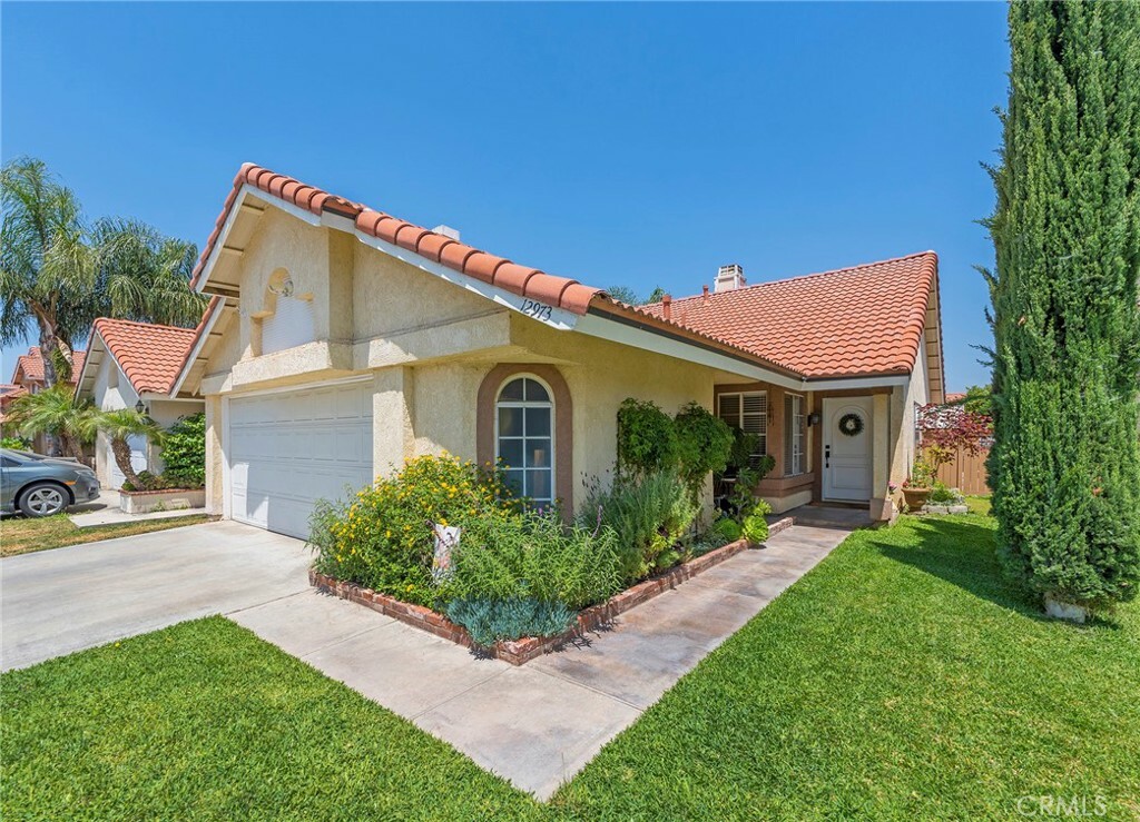 Property Photo:  12973 Winter Sun Way  CA 92503 