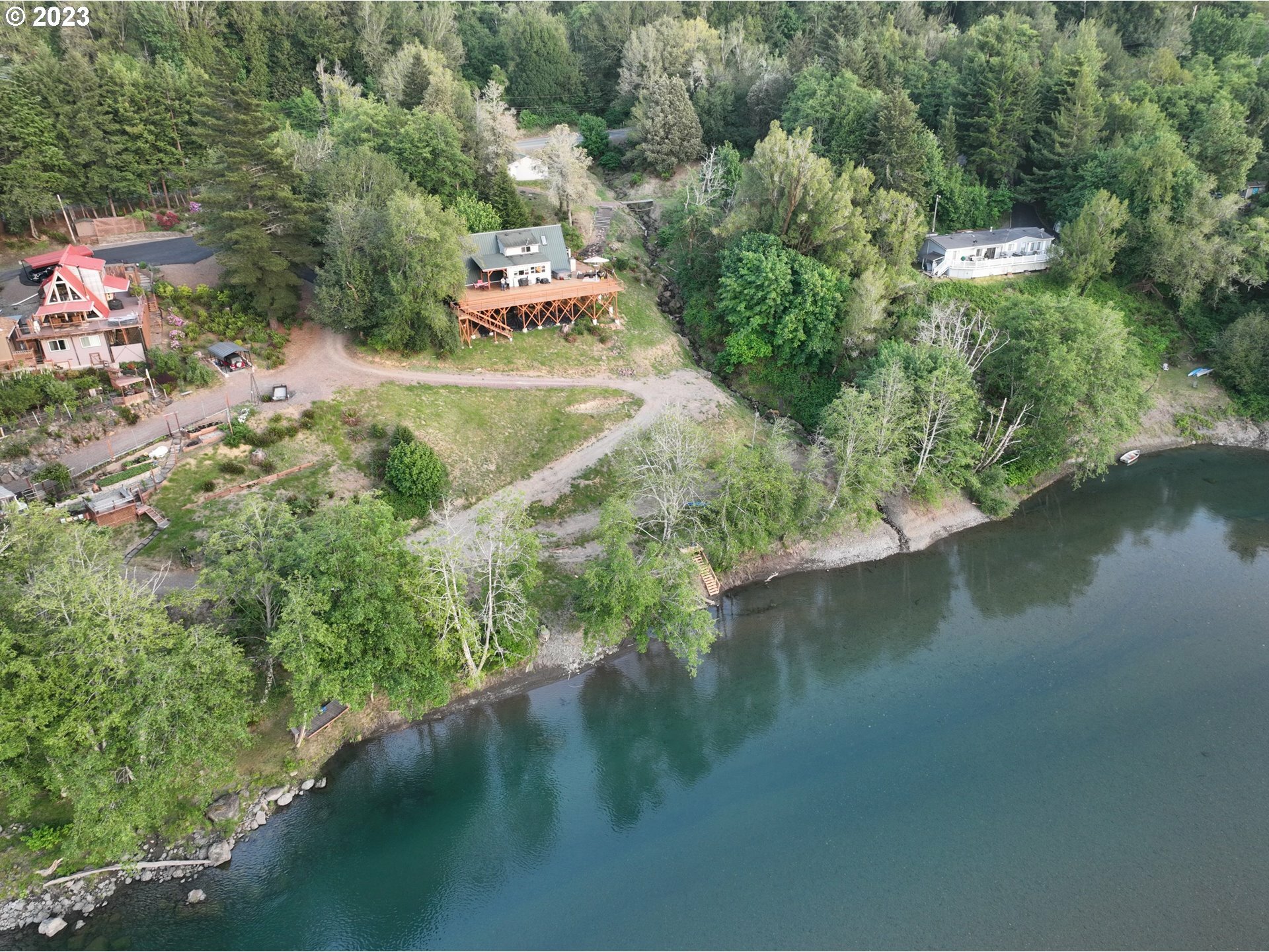Property Photo:  99749 S Bank Chetco River Rd  OR 97415 
