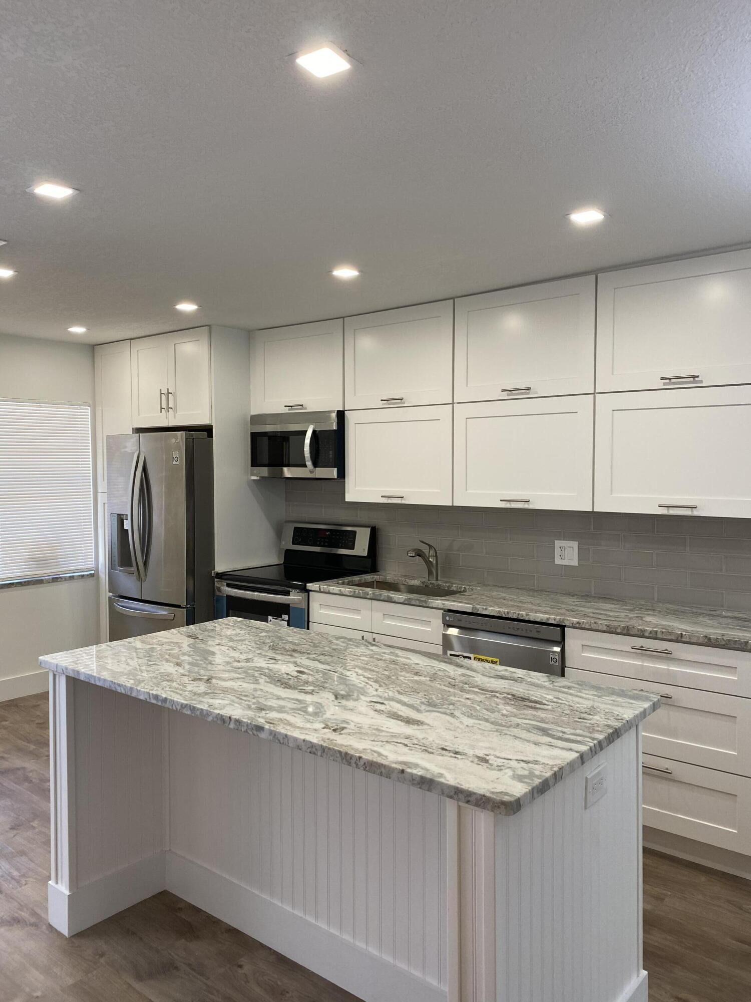 Property Photo:  9199 Pecky Cypress Lane 7E  FL 33428 