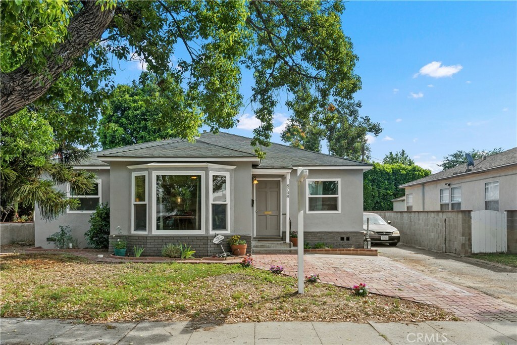 Property Photo:  8748 Sparton Avenue  CA 91331 