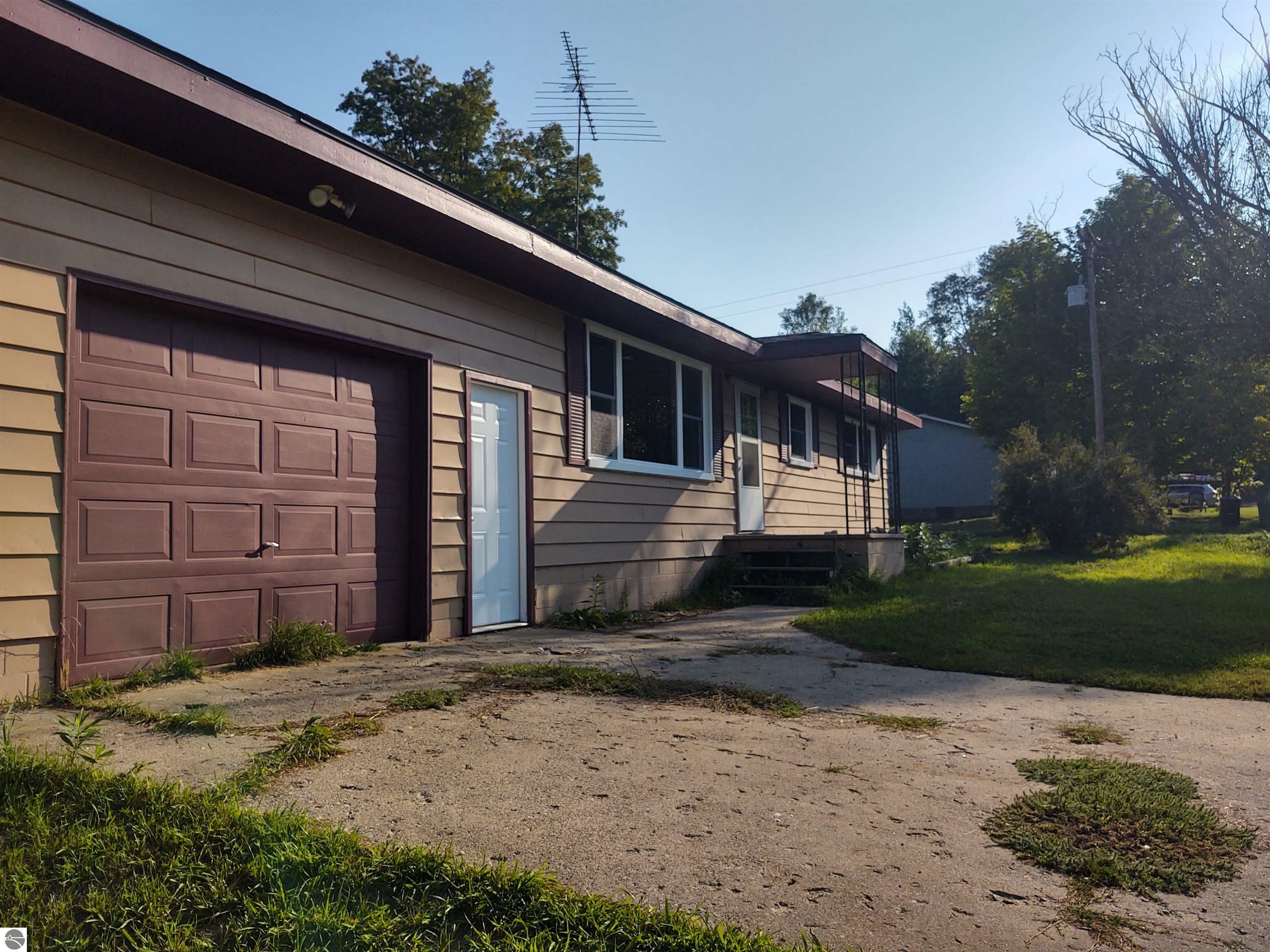 Property Photo:  1264 NW Wood Road  MI 49676 