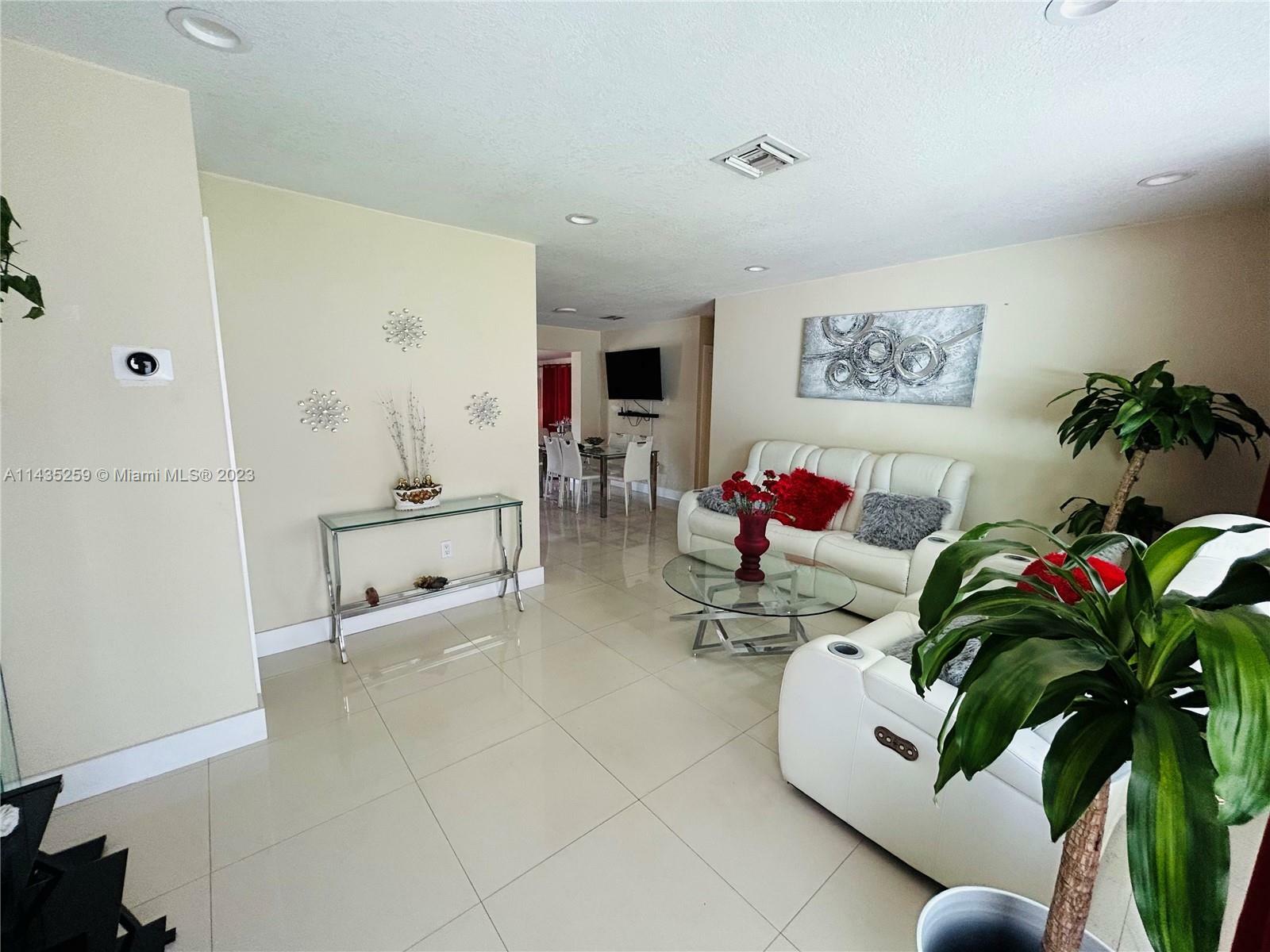 Property Photo:  635 W 72nd Pl  FL 33014 