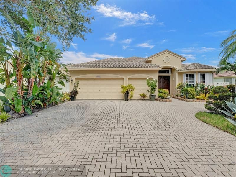 Property Photo:  5933 NW 56th Dr  FL 33067 
