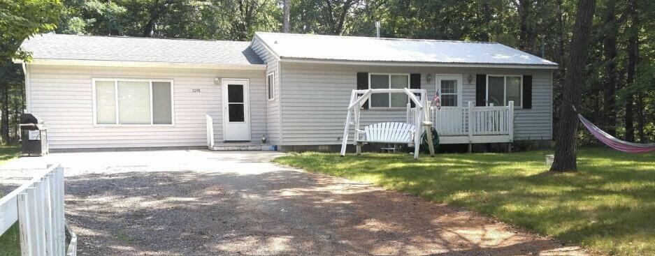 Property Photo:  3098 Minnepata Trail  MI 48748 