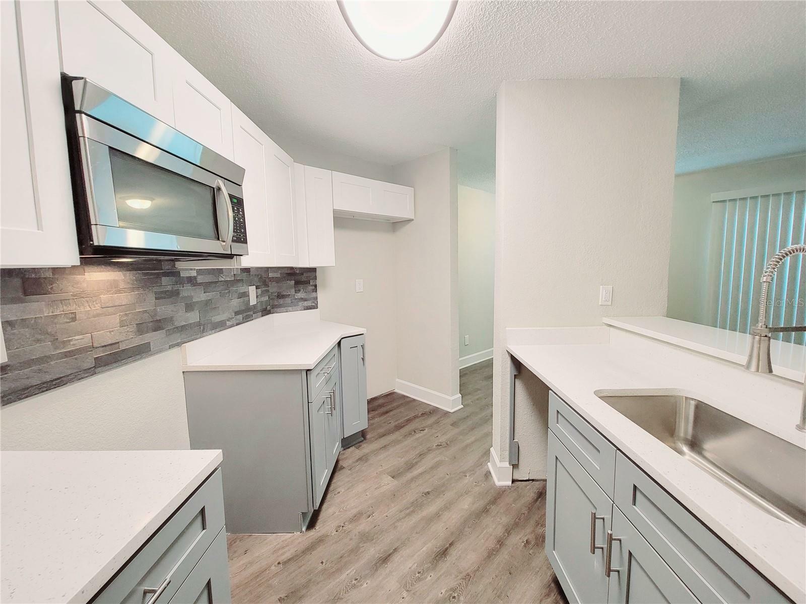 Property Photo:  2552 Woodgate Boulevard 102  FL 32822 