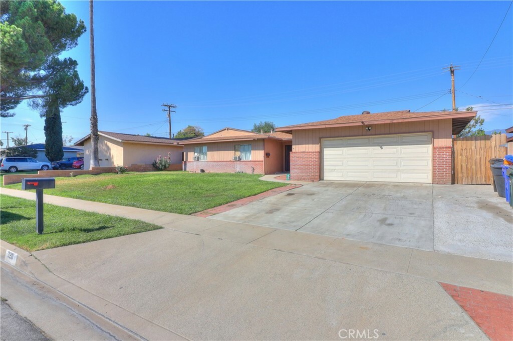 Property Photo:  320 W Heather  CA 92376 