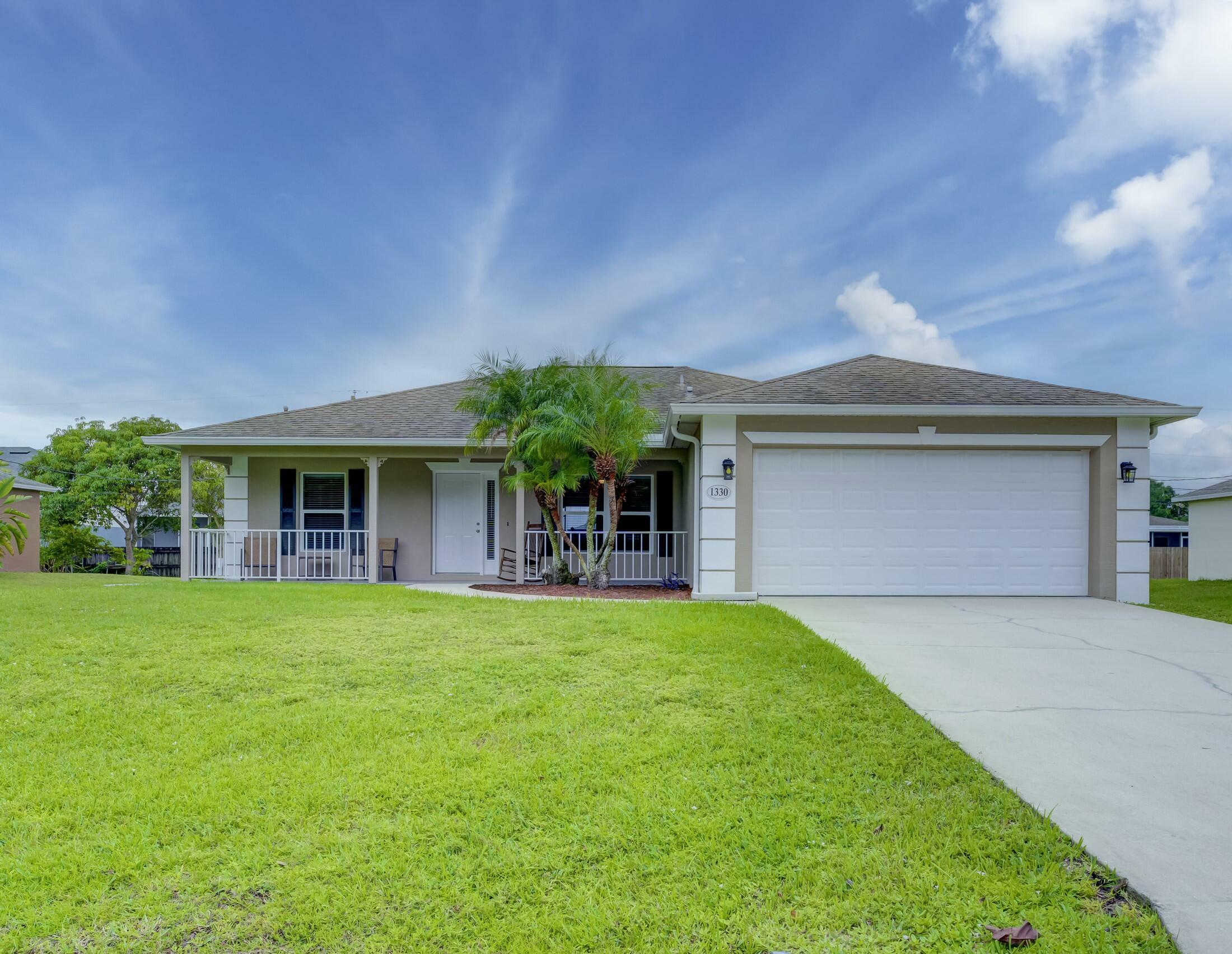 Property Photo:  1330 SW Parma Avenue  FL 34953 