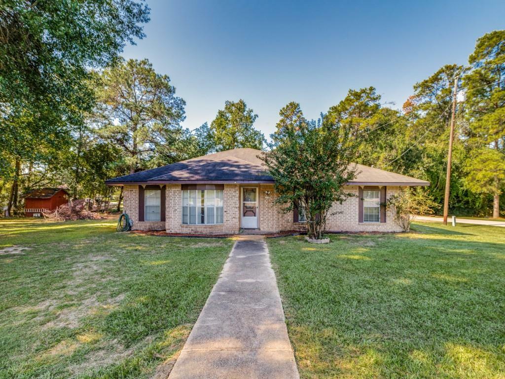 Property Photo:  215 Valley View Drive  TX 77331 