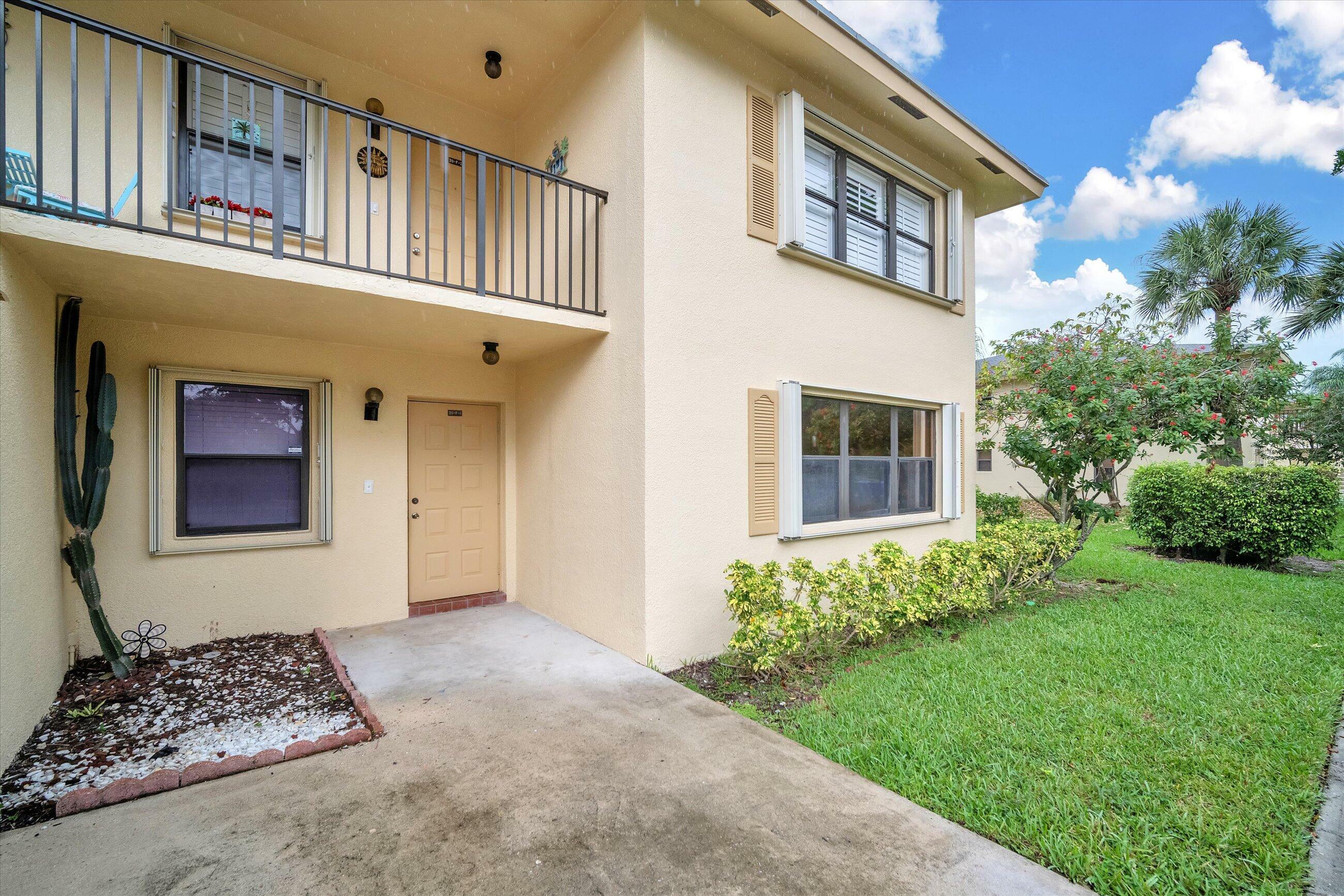 Property Photo:  2916 SW 22nd Circle 201F  FL 33445 