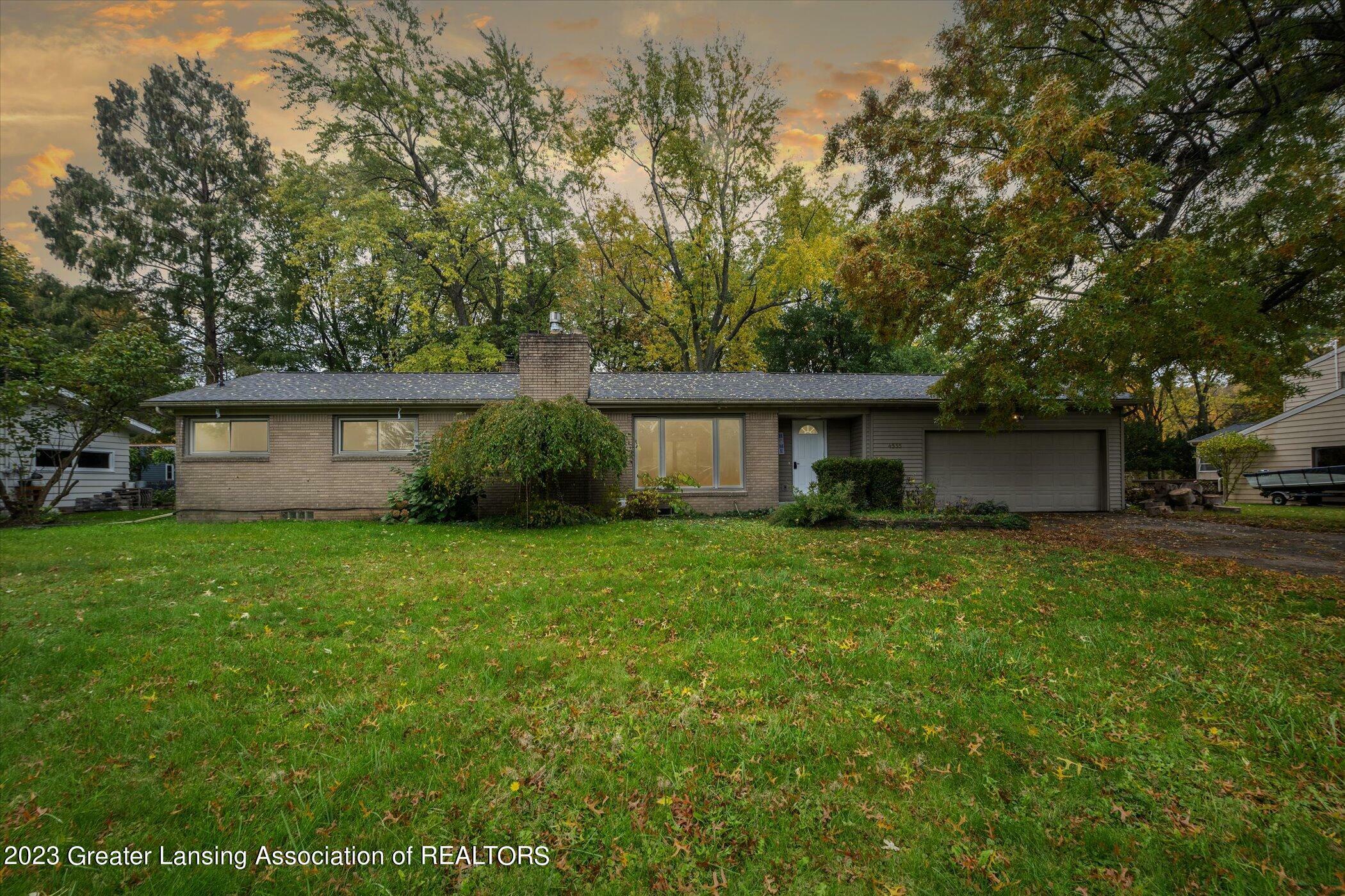 Property Photo:  4555 Eastwood Drive  MI 48864 