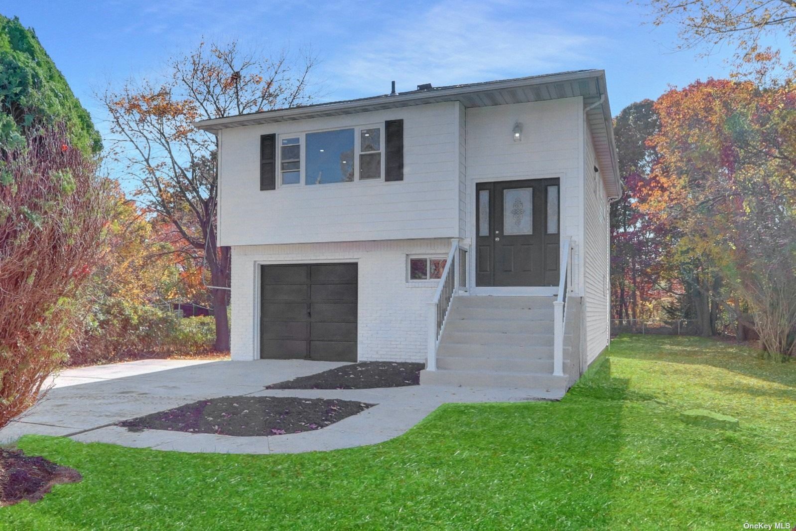 Property Photo:  456 Spur Drive N  NY 11706 